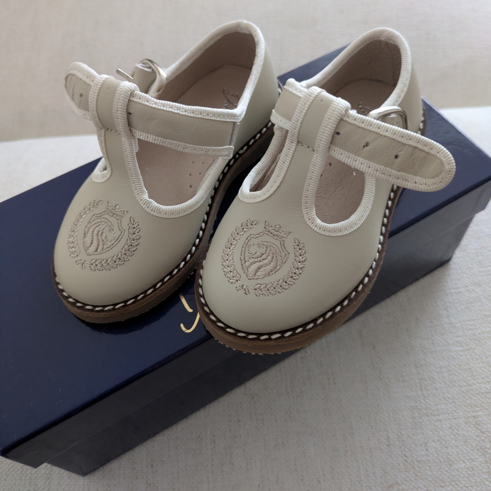 Cream T-Strap Leather Dress Shoes with Embroidered Crest